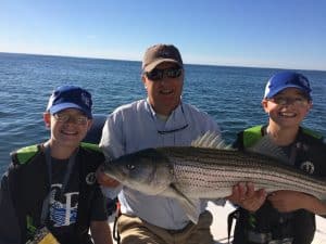 Kids and Families are welcome on Miss Jodine Fishing with a huge striper